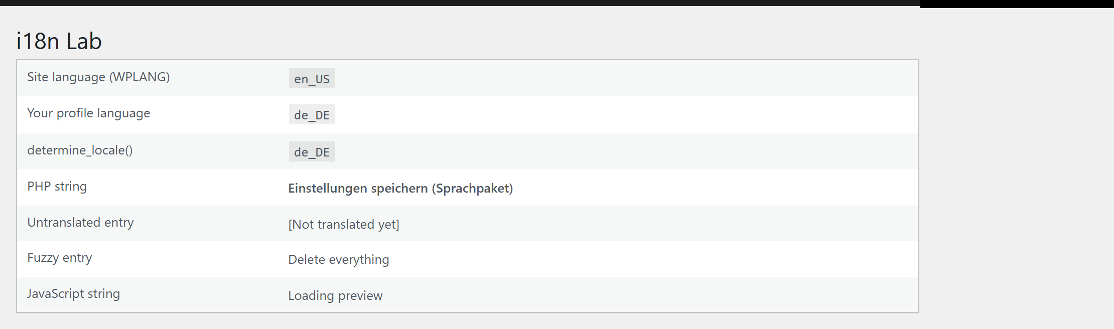 The test page: the PHP string shows the language pack's copy, the script's string is English.